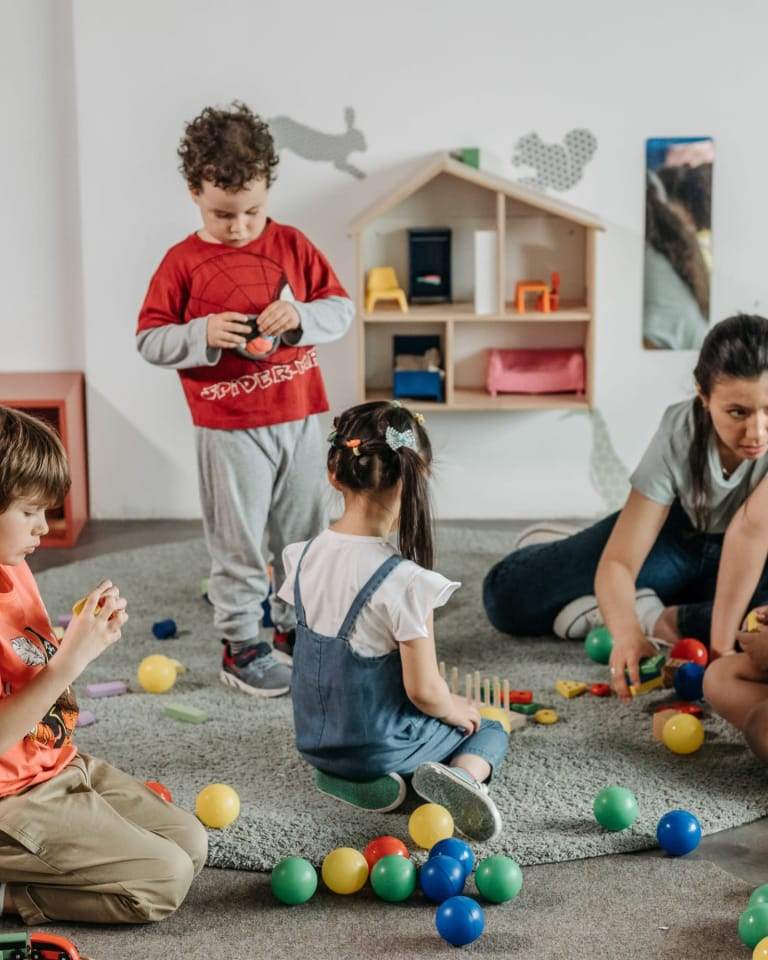 Children playing in a Head Start classroom